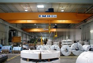 Two 30-ton cranes with engineered hoists handle the demanding service cycle of moving large coils for two shifts a day