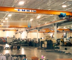 This installation at a manufacturer of roll forming equipment consists of 15 structural girder cranes with capacities from 1/2 to 5 tons. This installation includes five bridge crane runways, with lengths varying from 70 to 250 feet. Nearly all of the cranes are used in workstation areas